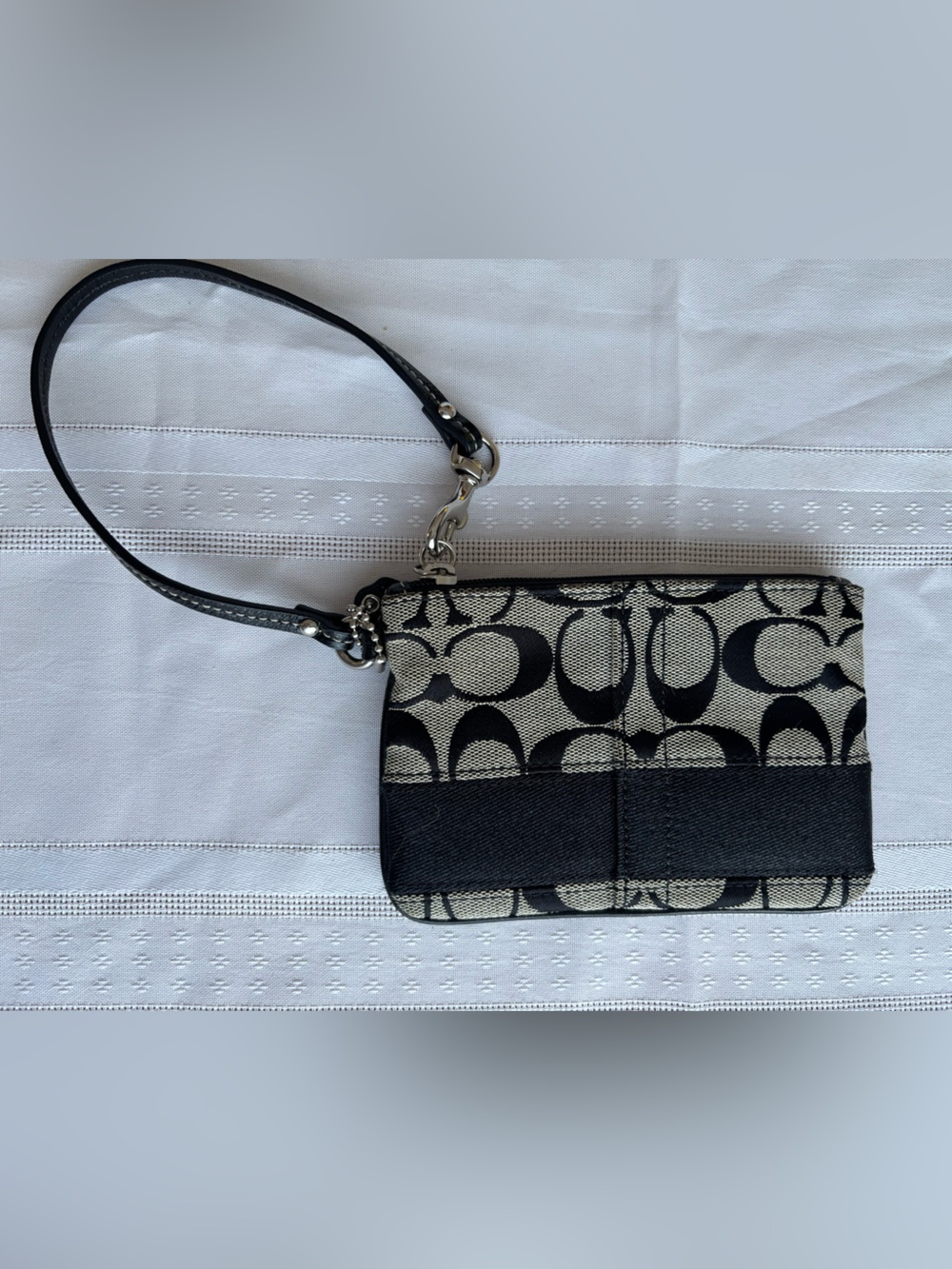 Coach Black and Greyish Cream Signature Canvas Wristlet